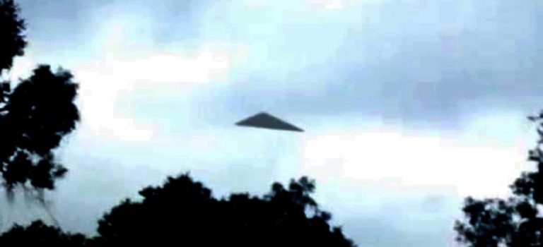 Huge Black Triangle UFO at Treetop Level